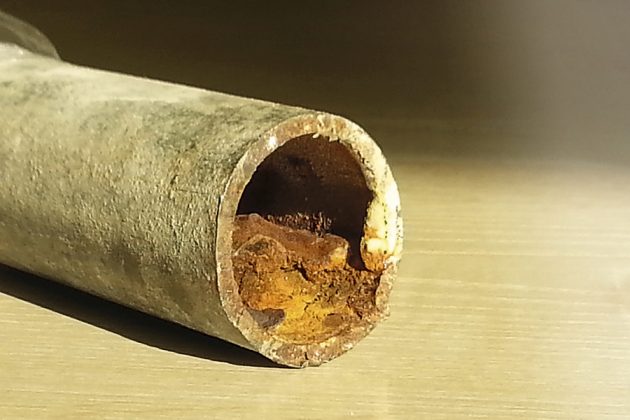 Užterštas plieninis vamzdis